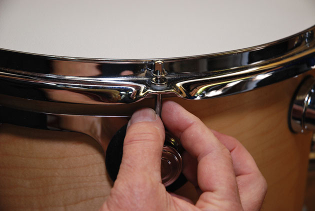 how to change drum heads by setting counter hoops